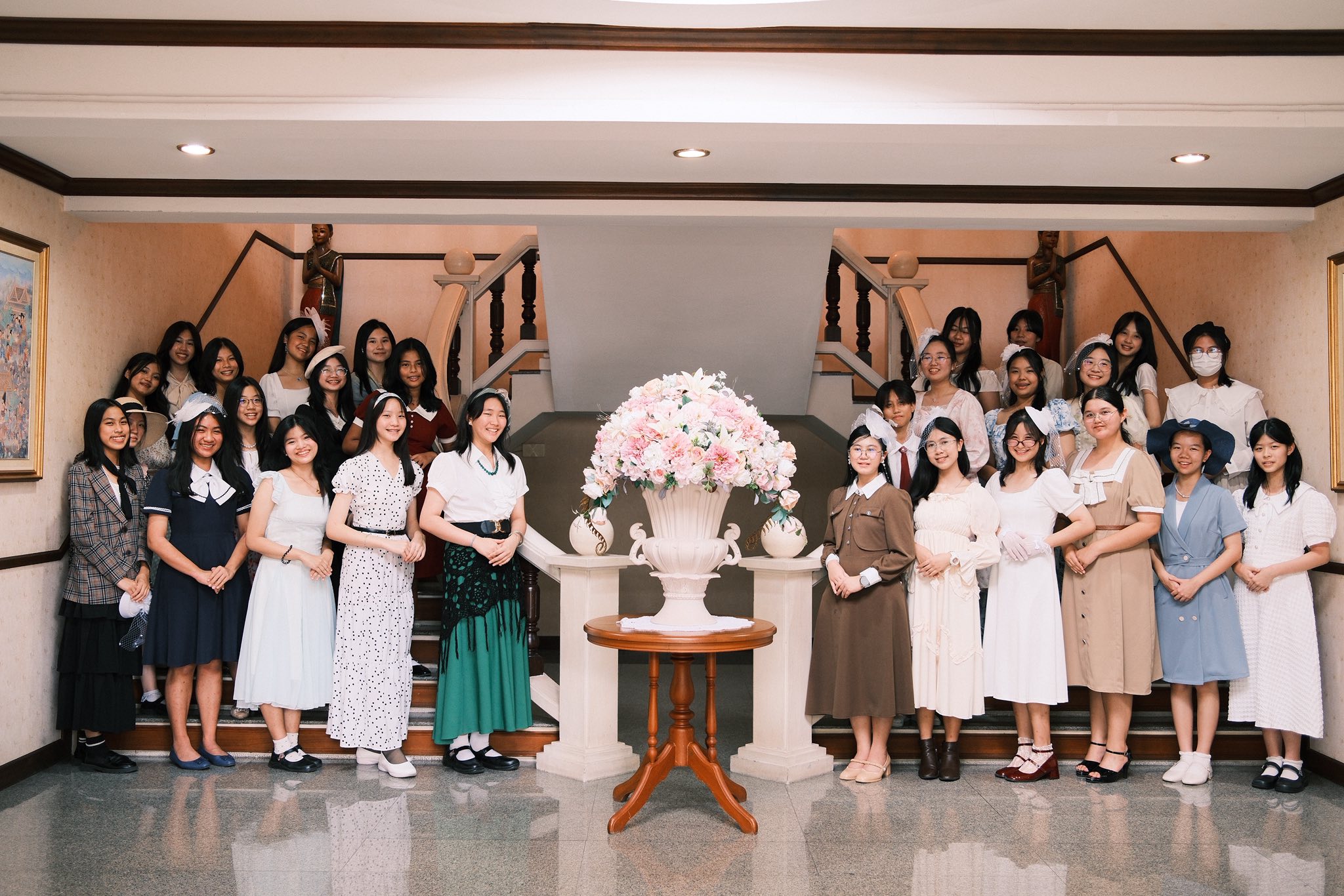 Students in traditional Thai outfits during Thai Language Week celebration