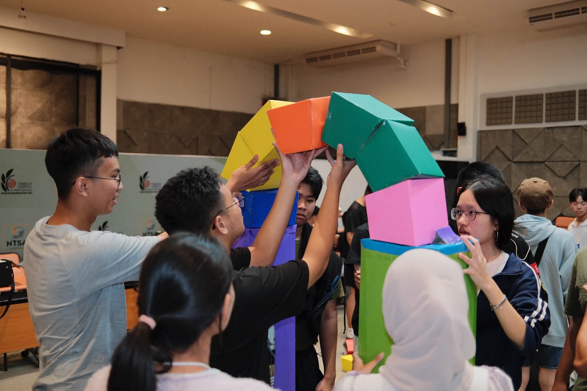 Collaborative building activity at camp